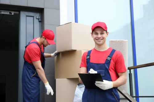 Packing and loading items into a removals van in Camden