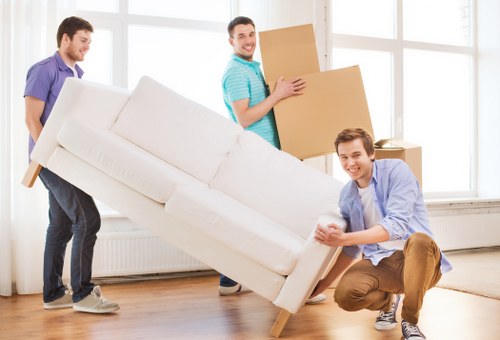 Boxes and furniture being loaded for a Camden flat or house move