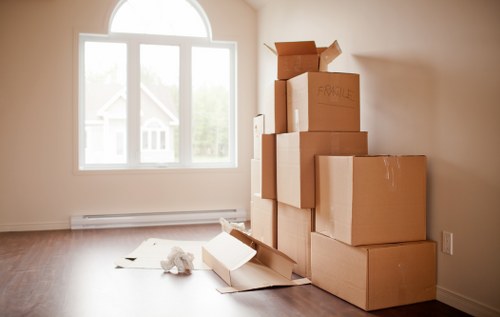 Prepared boxes and furniture ready for a Camden moving van service