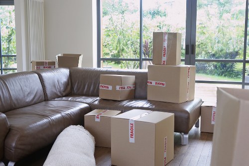 Furniture and boxes being carried for a Camden home or office move